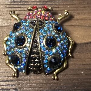 Vintage Rhinestone Ladybug Brooch Blue Aurora Borealis Gold Tone Statement Pin